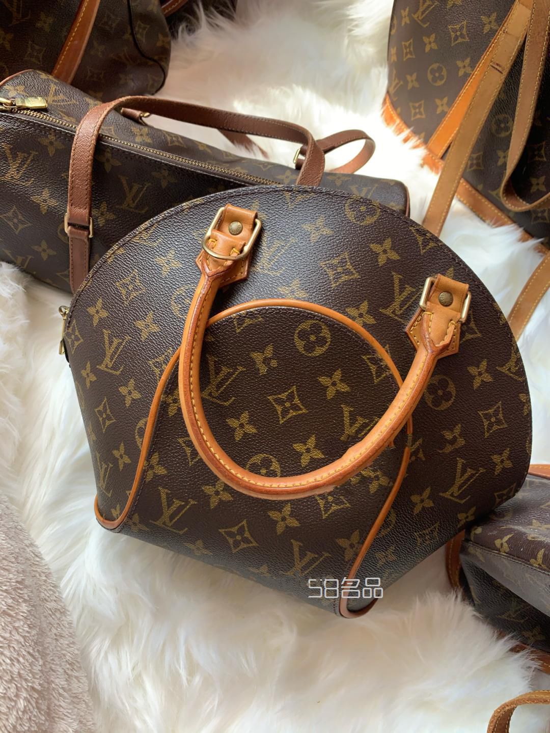 lv 中古包 河蚌包扇贝包,lv黄皮变色_1